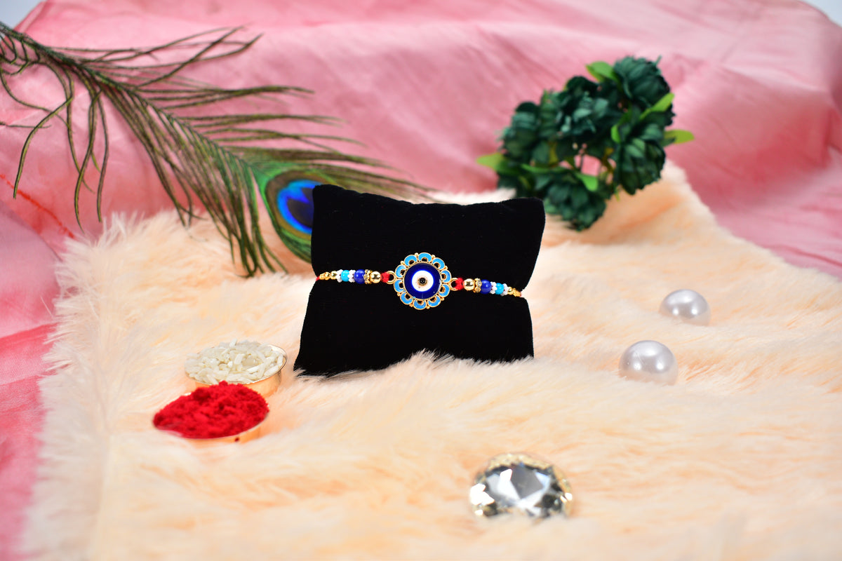 Evil Eye Rakhi With Blue Beads And Golden Accents  Protective Nazar Design