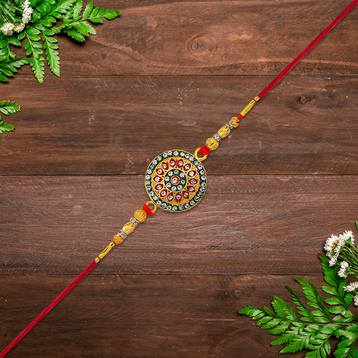 Royal Designer Rakhi With Kundan Centerpiece Red  Green Enamel Work And Golden Beads