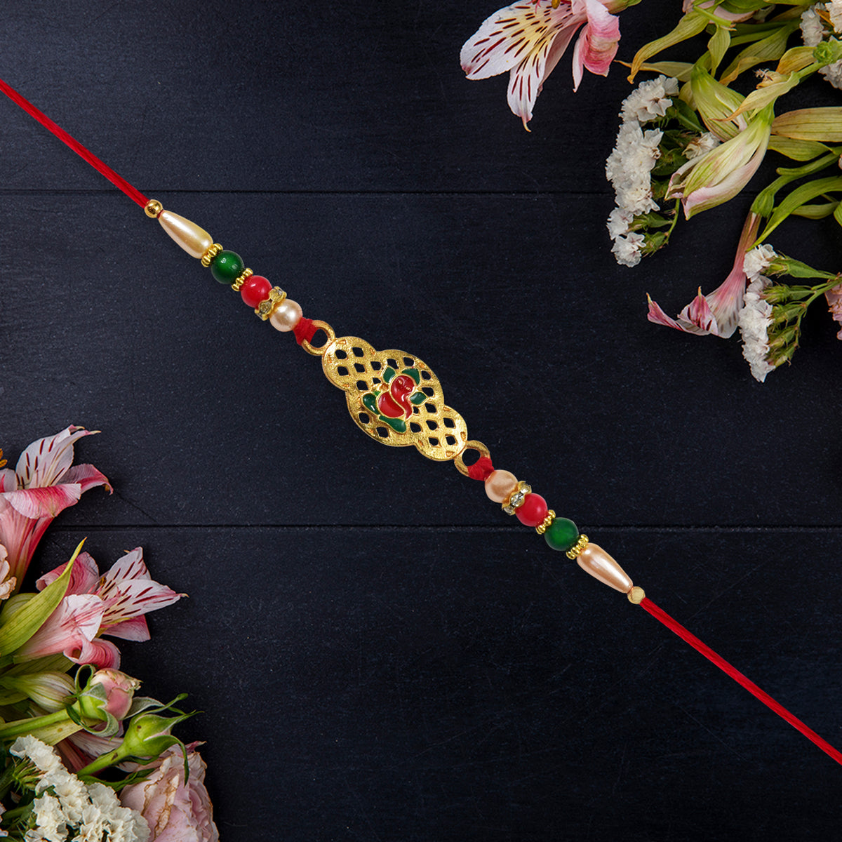 Religious Ganesha Rakhi In Gold Finish